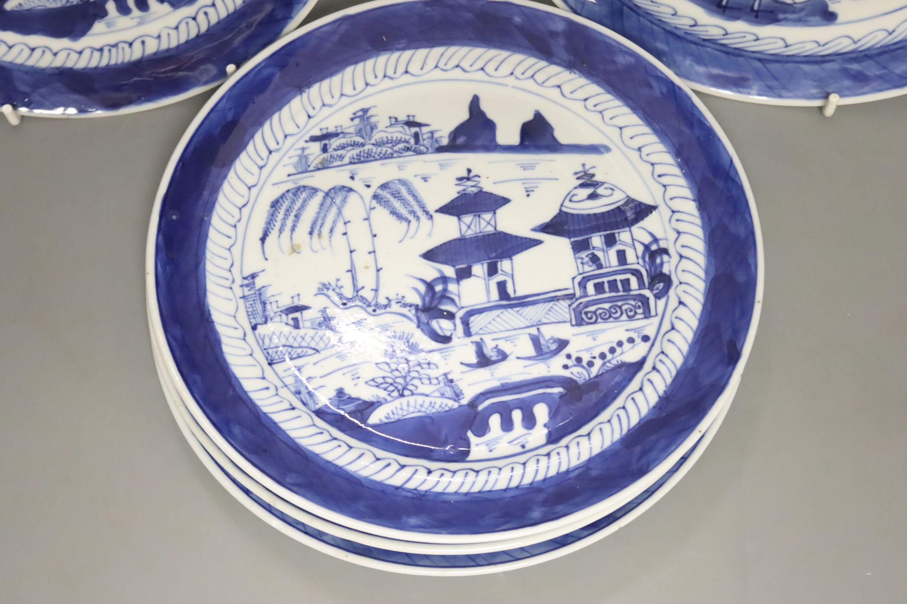 A set of five late 19th century Chinese blue and white landscape plates, diameter 20cm